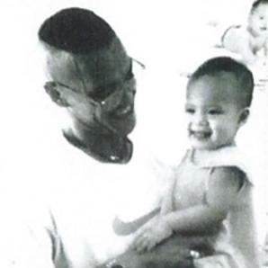 <span style="color: #000000 !important;font-size: 14pt">Todd Adamson, a polio victim, enjoyed interacting with babies in the orphanage where he was left as an infant 29 years ago.</span>