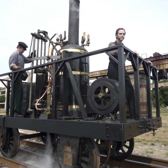 <span style="color: #000000 !important;font-size: 14pt">Peter Cooper, portraid by Scott Klavan, on the Tom Thumb steam locomotive</span>