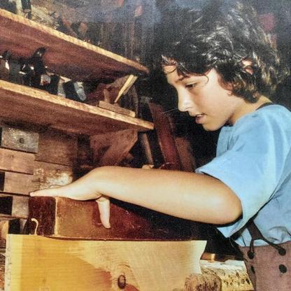 <span style="color: #000000 !important;font-size: 14pt">Young Peter Cooper working on an early invention</span>