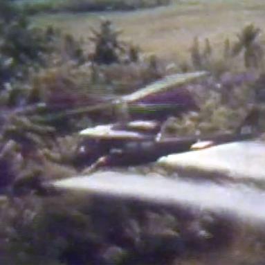 <span style="color: #000000 !important;font-size: 14pt">A US military helicopter disperses chemicals over a jungle canopy in South Vietnam.</span>