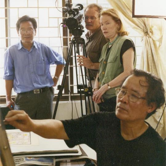 <span style="color: #000000 !important;font-size: 14pt">Pham Thanh Liem, seen here at work, is the artist who drew the Dioxin Bird, symbolizing the chemicals, including but not limited to Agent Orange, that were sprayed over South Vietnam.</span>