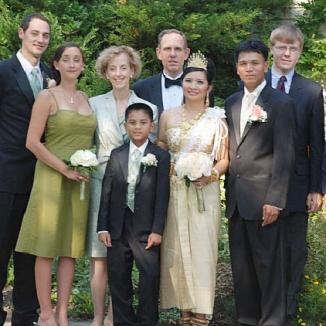 <span style="color: #000000 !important;font-size: 14pt">Adoptive parents Susan and John Beers with their family at Sayon and Sophy's wedding in 2007.</span>